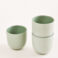 Moss: Three green matte porcelain short tumblers.
