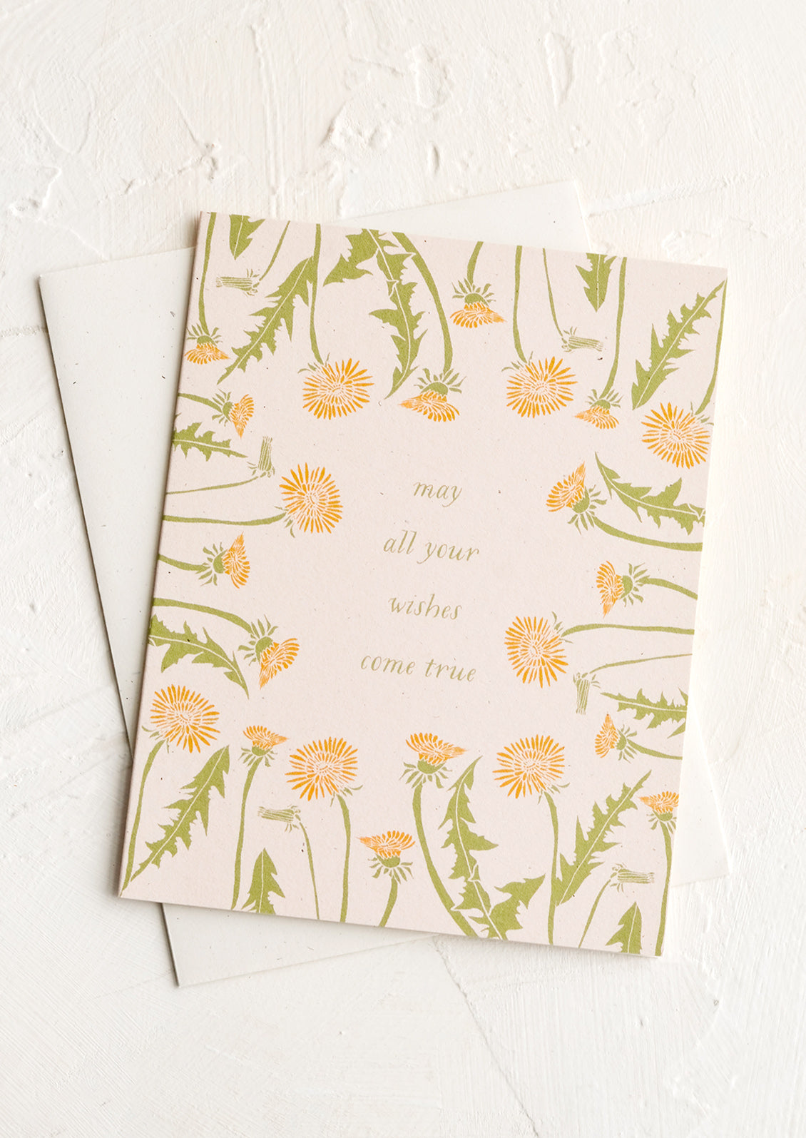 A greeting card with text reading "May all your wishes come true".