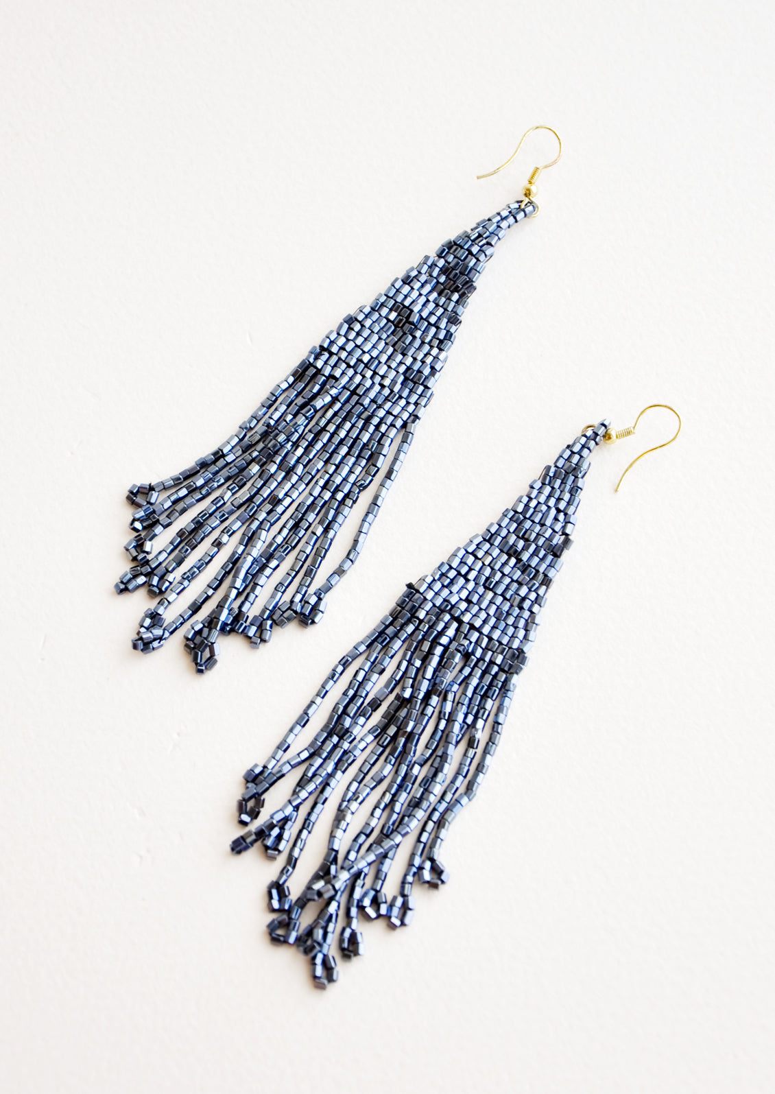 Dark blue iridescent beaded fringe earrings.