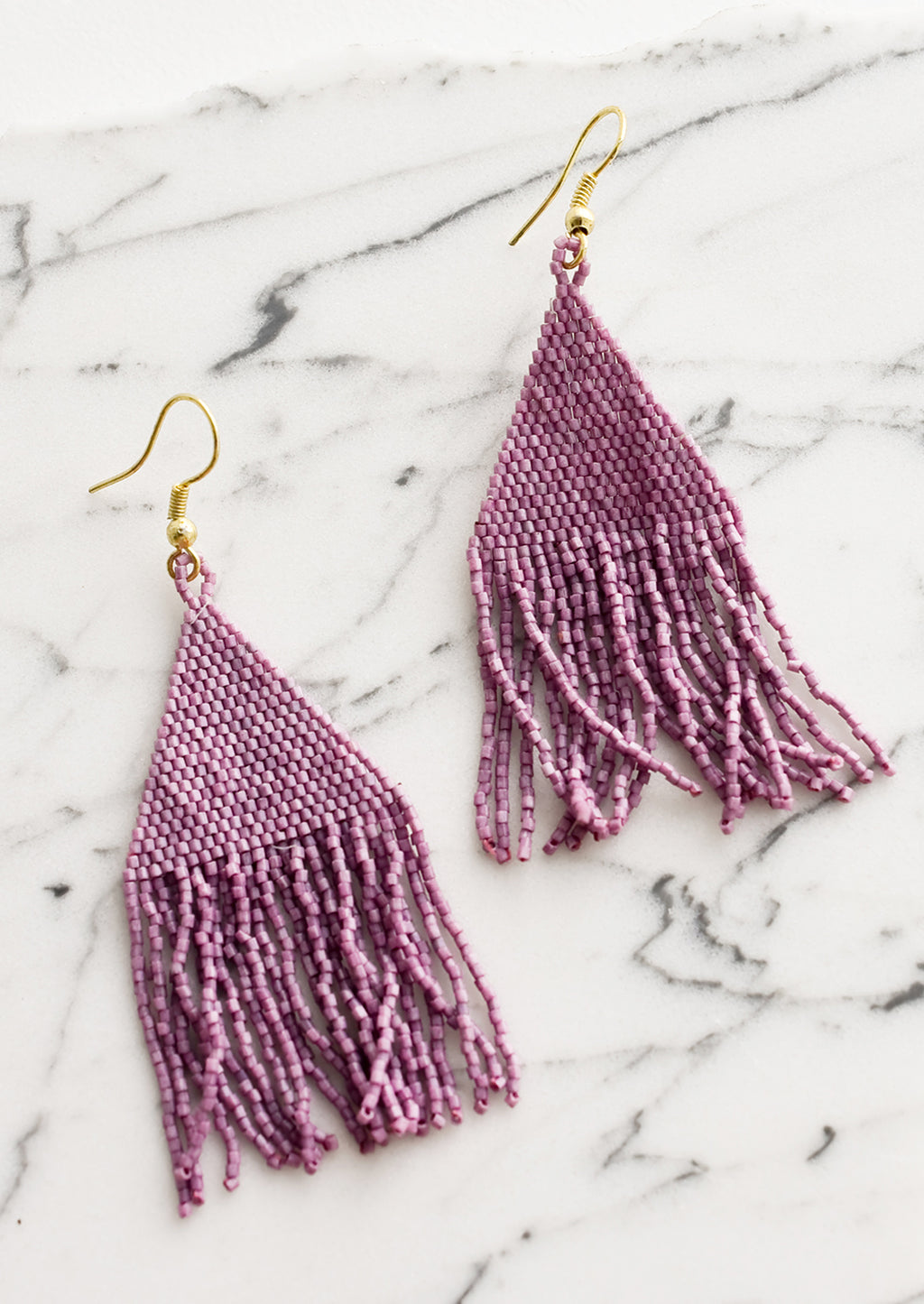Amethyst: Metallic lavender triangular fringe beaded earrings.