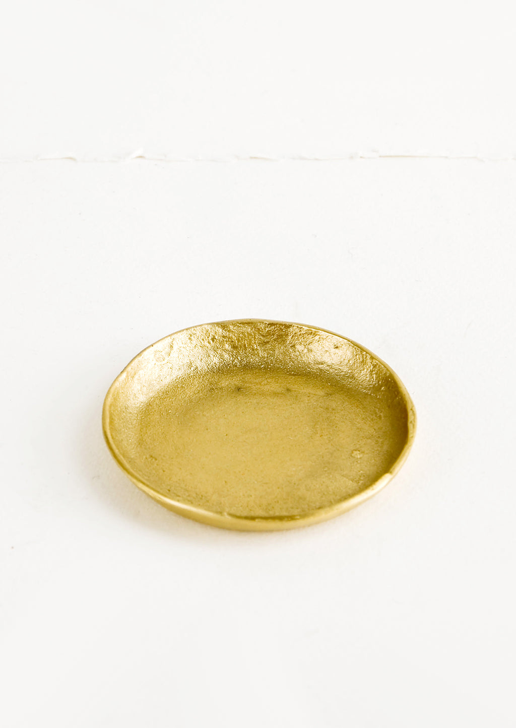 Plate: Small brass plate with organic, natural texture