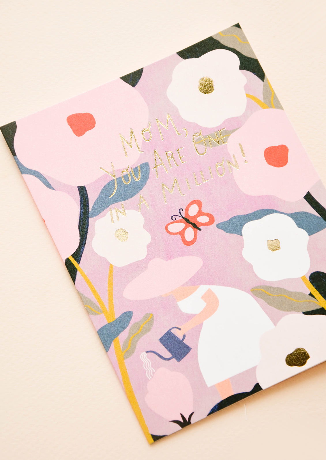 Greeting card with gardening graphics, text reads "Mom You Are One In A Million!"