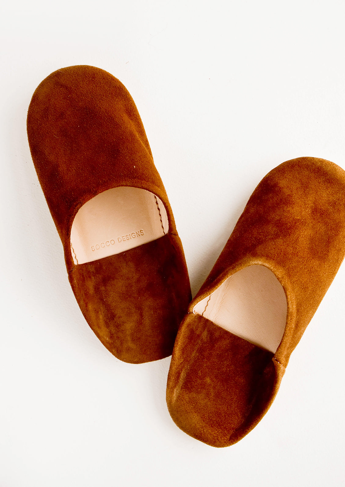Pair of suede house slippers in sienna brown