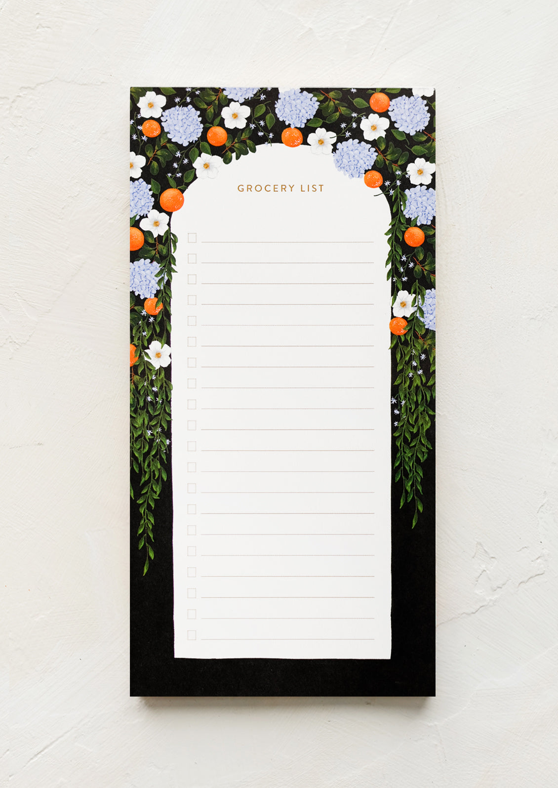 A grocery list notepad with citrus arch print.