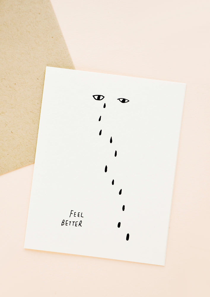1: Greeting Card with Pair of Eyes and Falling Teardrops, "Feel Better" text printed at bottom