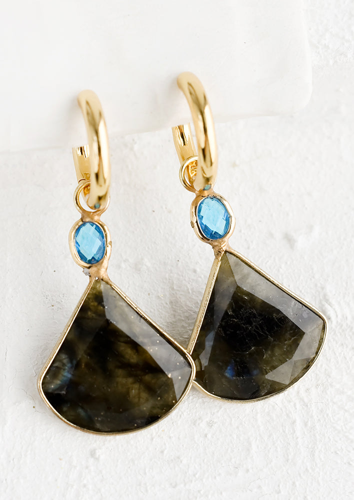 A pair of gold hoops with oval turquoise glass stone and pendulum shaped labradorite.