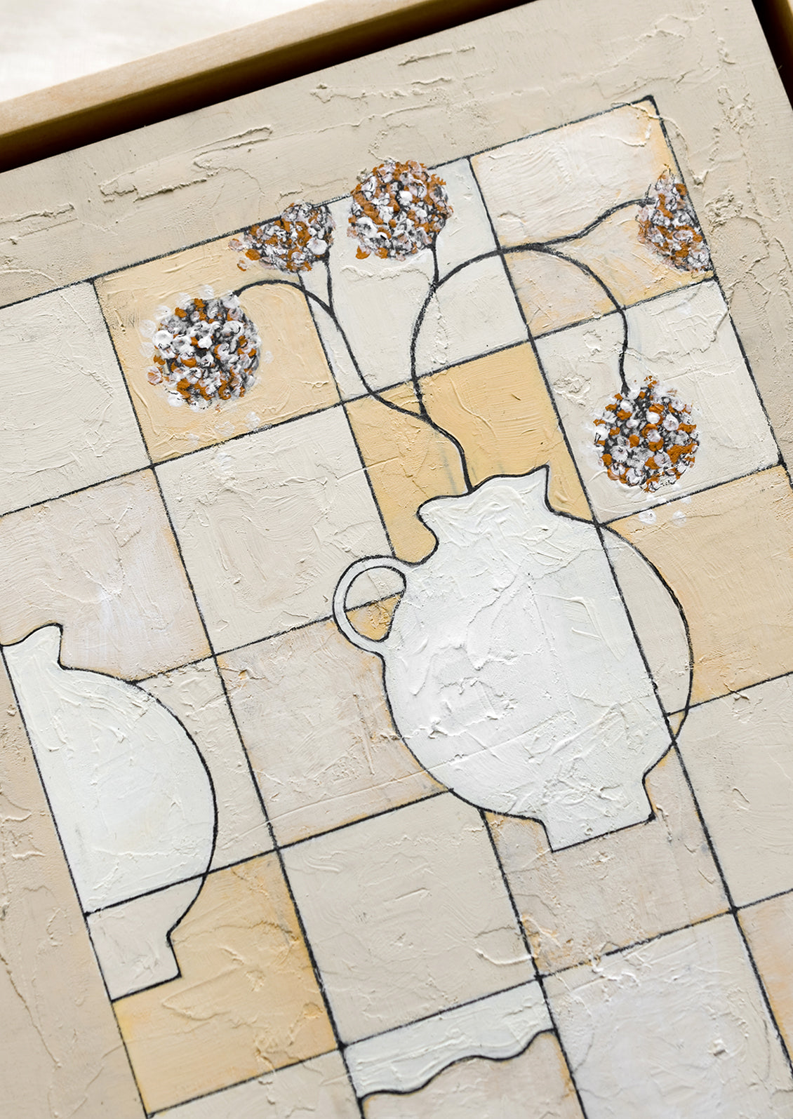 A framed still life painting of vase with flowers on checkered background.