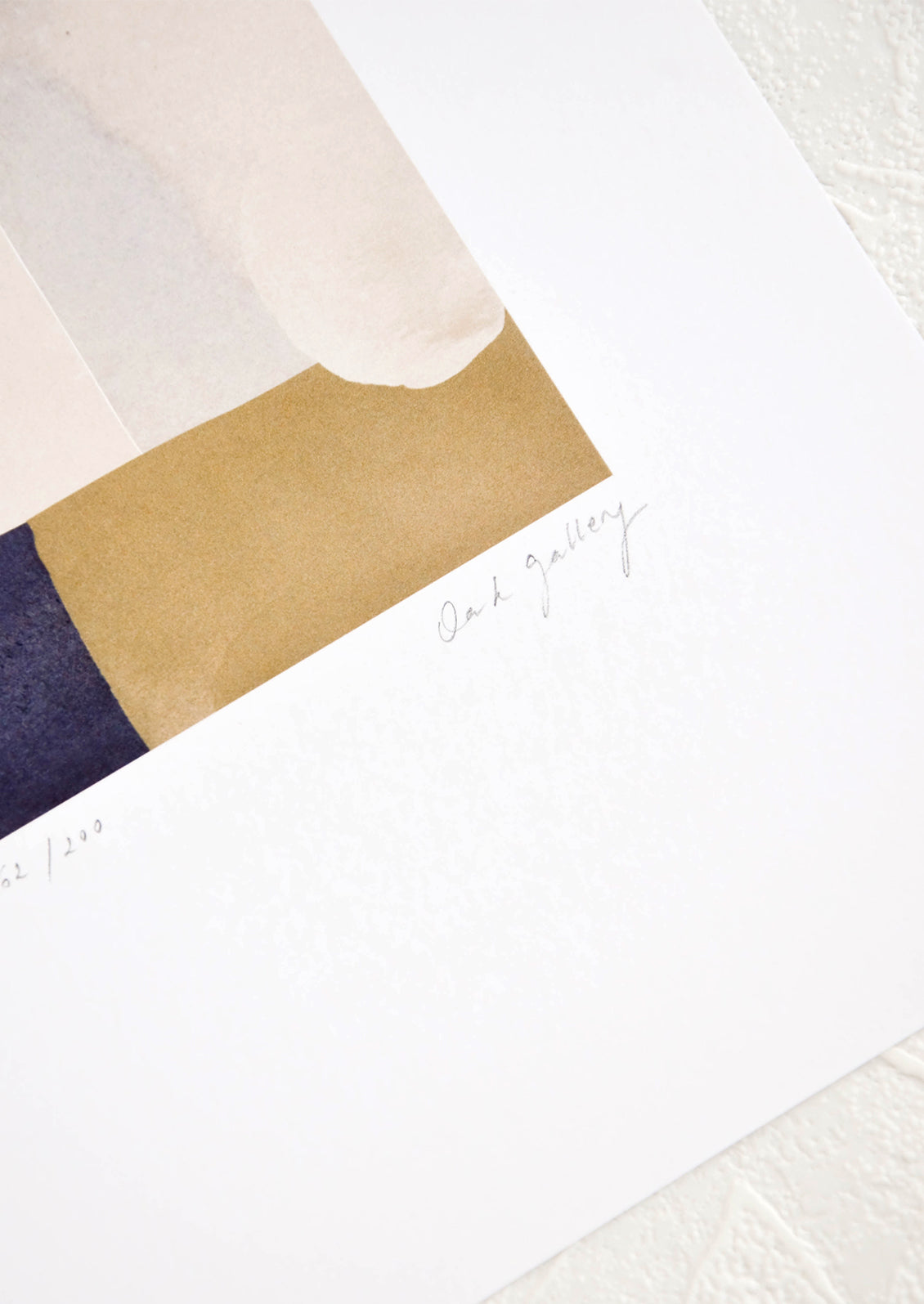 Artist's signature on corner of art print