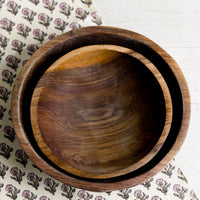 3: Two nesting olivewood bowls.