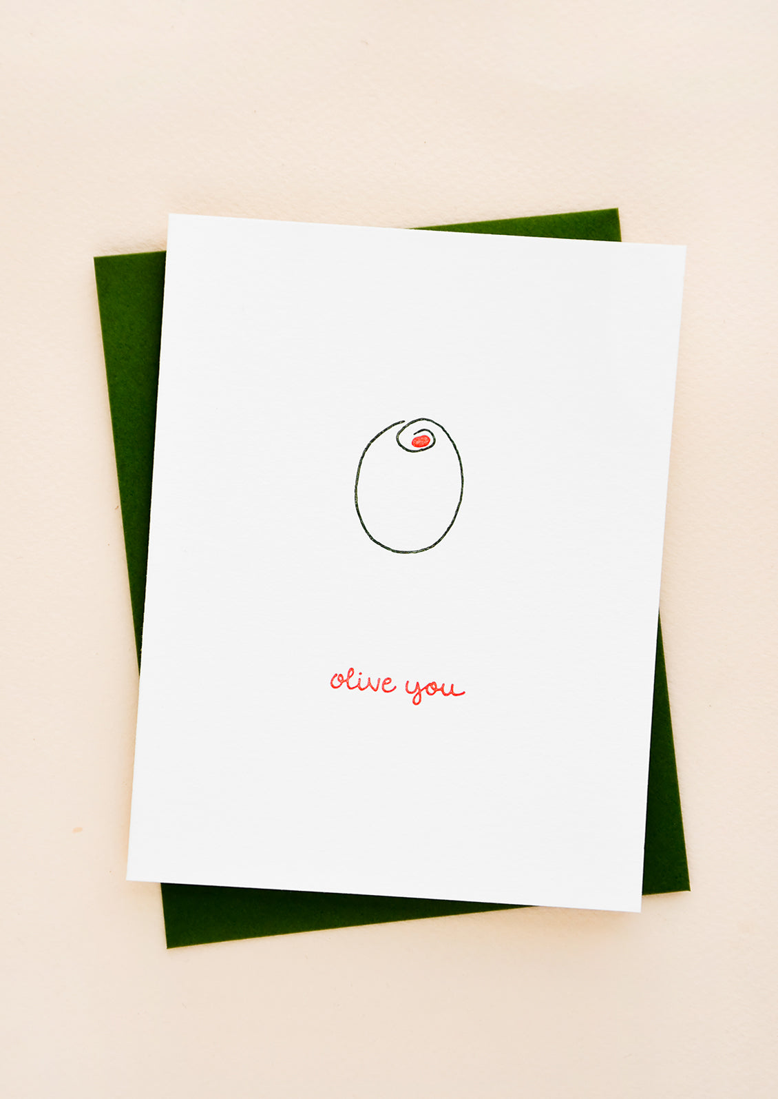 Greeting card with letterpress printed olive and red cursive reads "Olive you", paired with olive green envelope.