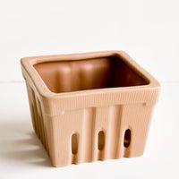 Cocoa: Ceramic basket in the style of disposable berry basket, shown in cocoa brown