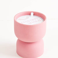 Mandarin & Mango: Scented candle in hourglass-shaped matte ceramic containers in dusty pink