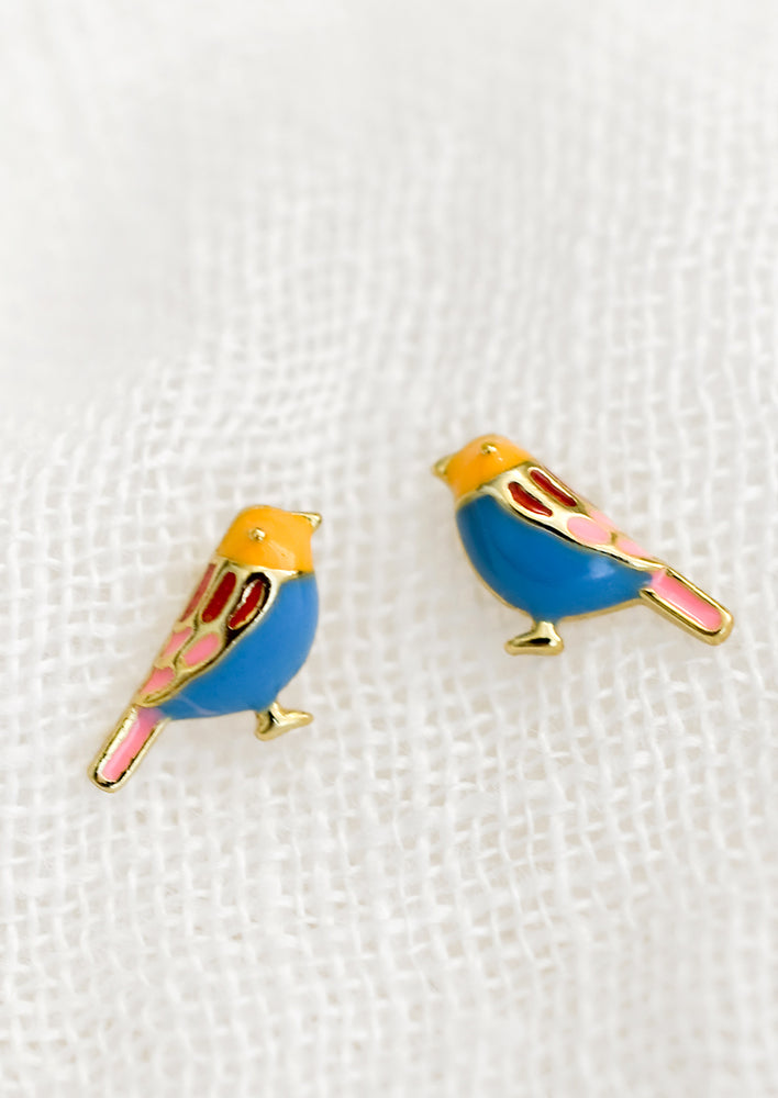 1: A pair of colorful enameled stud earrings in shape of a bird.