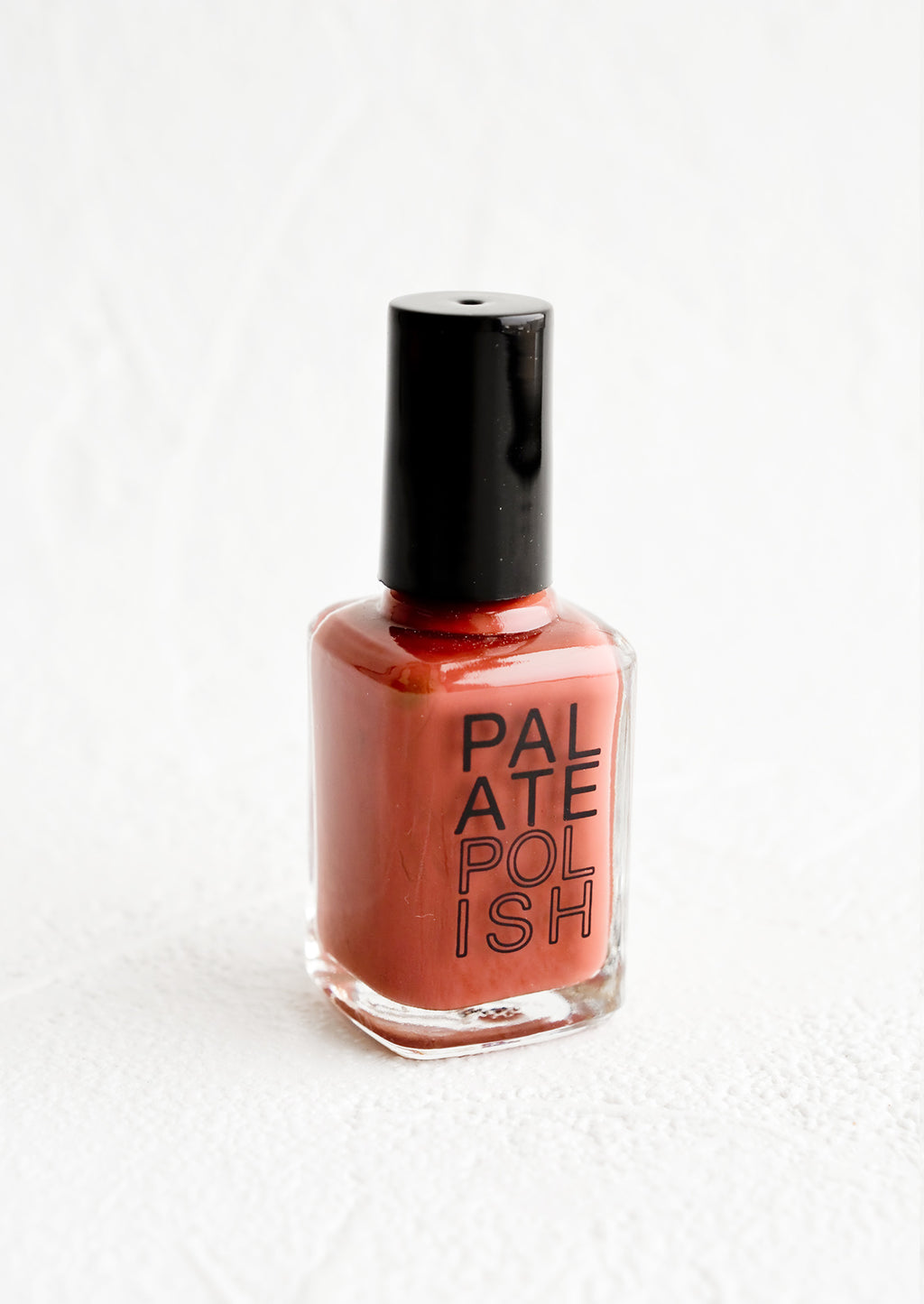 BBQ Sauce: A bottle of nail polish in desaturated cherry red.