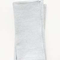 Mist: Pair of folded Linen Napkins in Misty Blue.