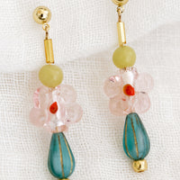 Pink Multi: A pair of multi beaded drop earrings with pink glass flower bead at center.