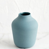 Mallard: A mallard colored porcelain bud vase.