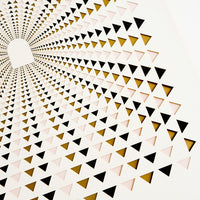 2: Detail of lasercut triangles in pink, brown and balack