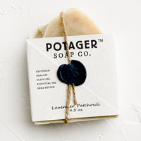 Lavender Patchouli: A bar soap in wax seal packaging.