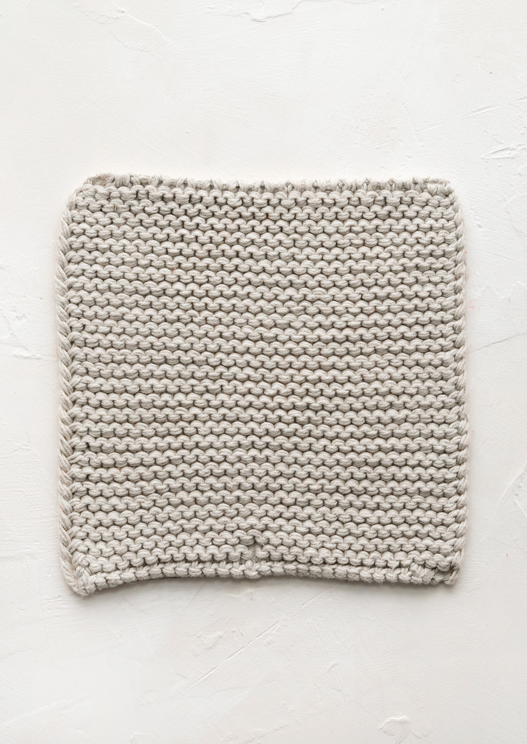 Oyster: A square, chunky knit cotton potholder in oyster grey.