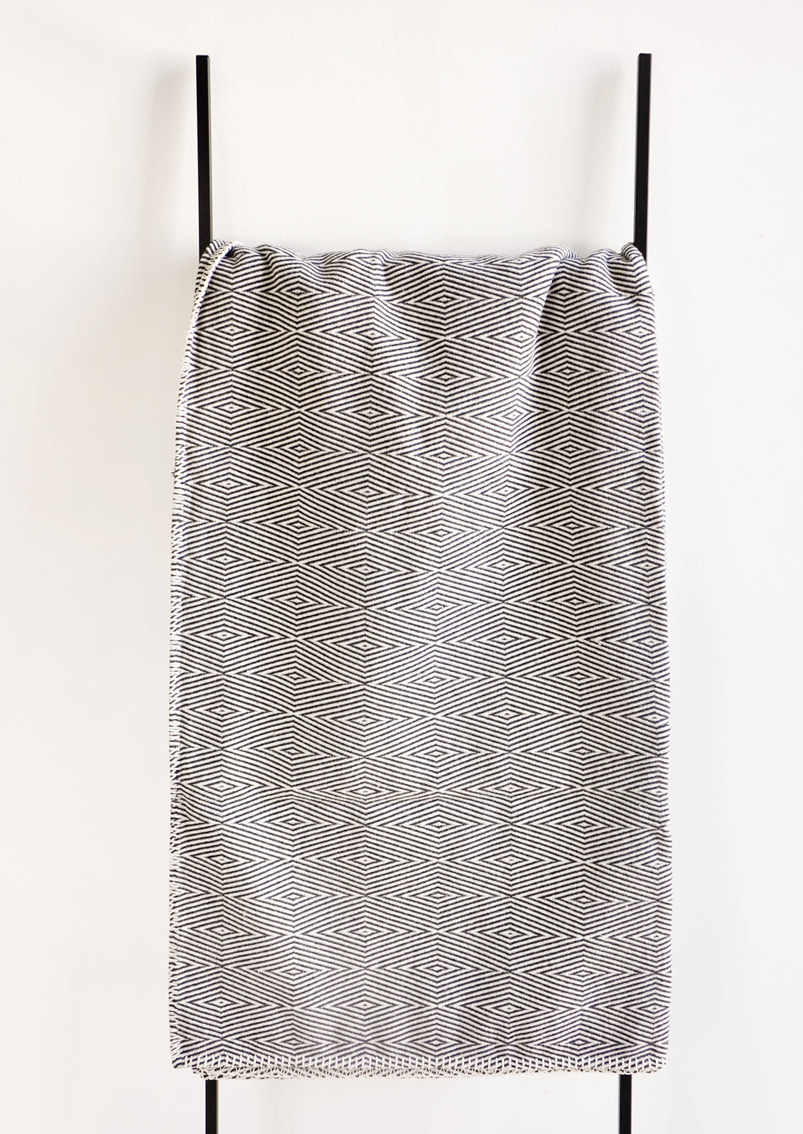 Blanket with Geometric Pattern in Black & White on Ladder - LEIF
