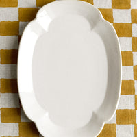 1: A quatrefoil shaped white ceramic platter/plate.