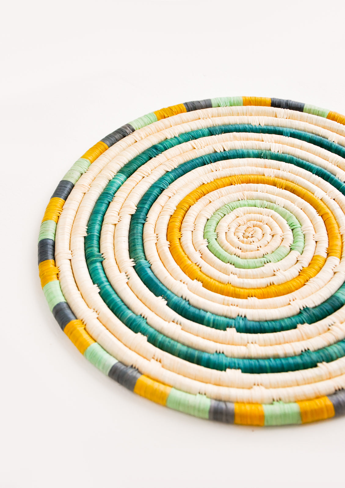 Radiant Rays Raffia Trivet in - LEIF