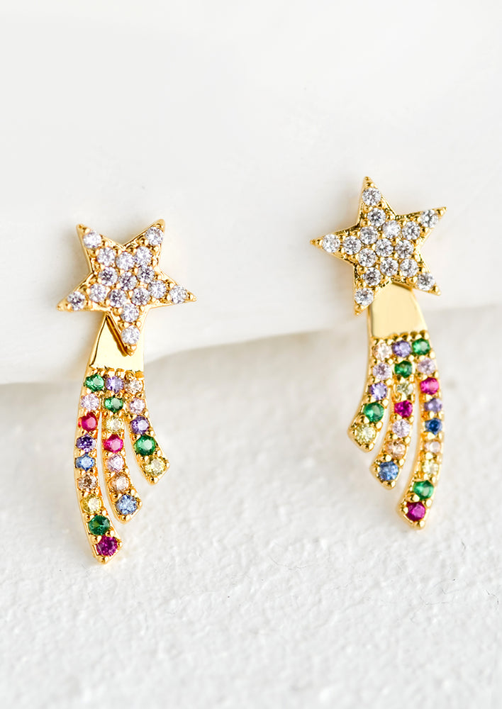 1: A pair of earrings with crystal star stud and multicolor starstream.