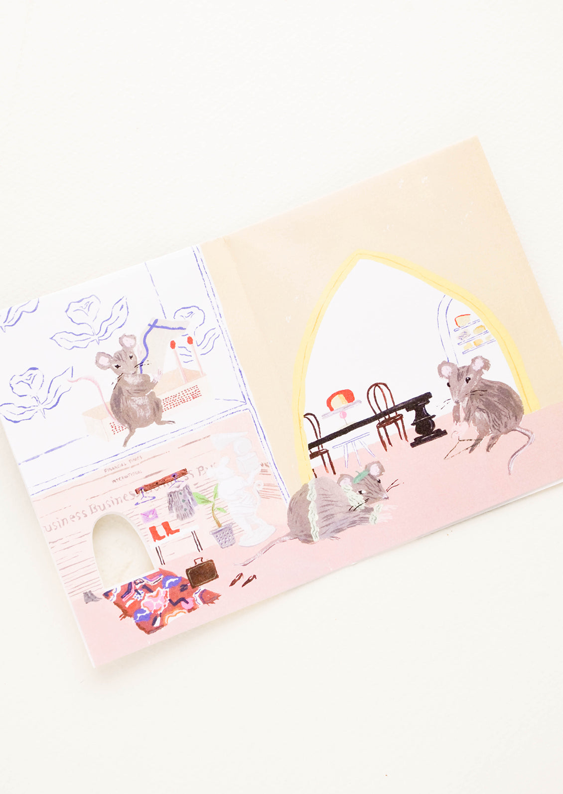 Inside of a greeting card with a full size illustration of mice having a party