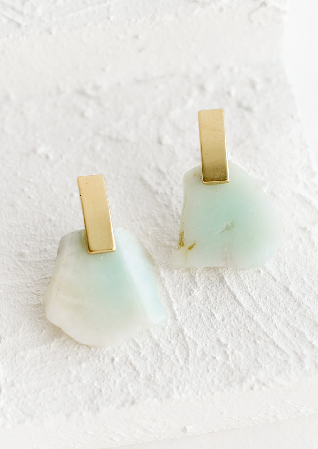 Amazonite: Pair of earrings with raw amazonite gemstone slice and rectangular brass posts.