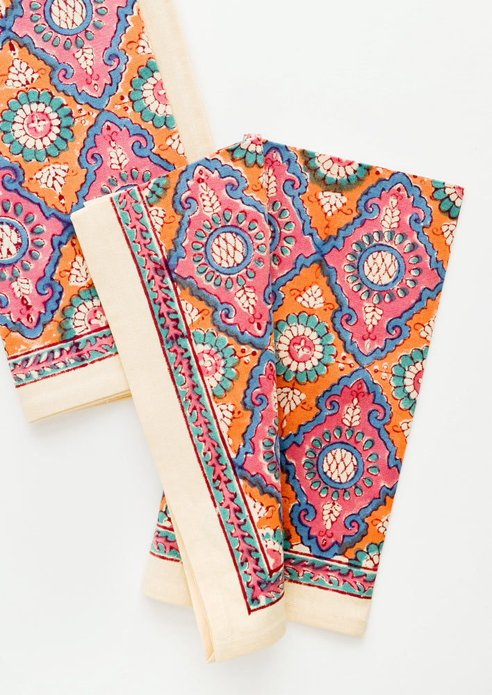 1: Pair of block printed cotton napkins in vibrant pink and orange pattern