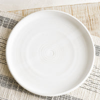 Matte White: A shallow serving plate in matte white.