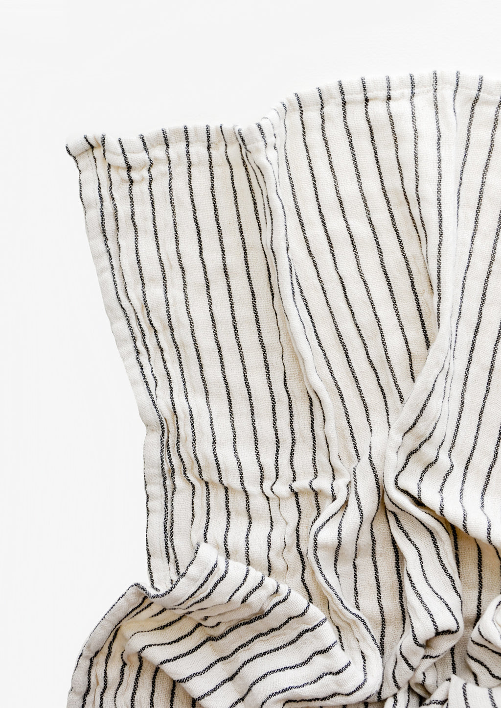 Cream / Black: Gauzy cotton tea towel in natural cotton with vertical black stripes
