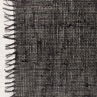 Midnight: A black woven straw placemat.