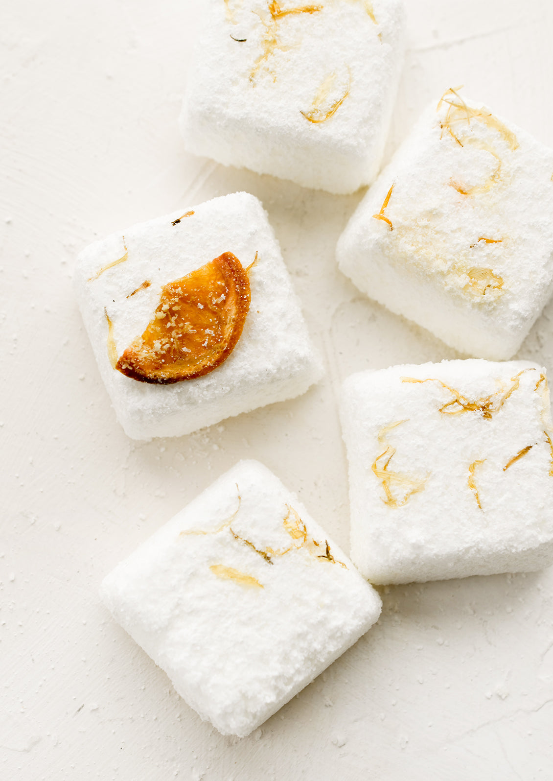 Shower steamer cubes with calendula and citrus.