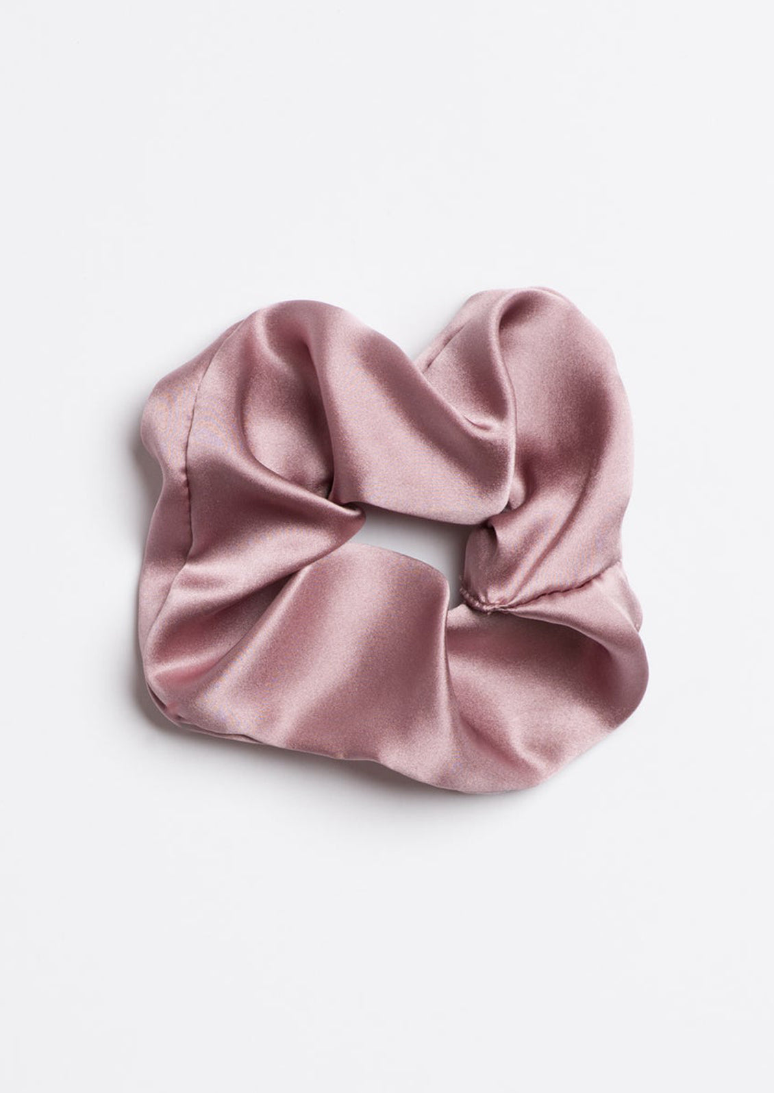 A silk scrunchie in light purple.