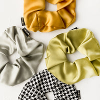 2: Silk scrunchies in assorted colors.