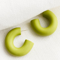 Green Apple: A pair of polymer clay hoop earrings in green apple.