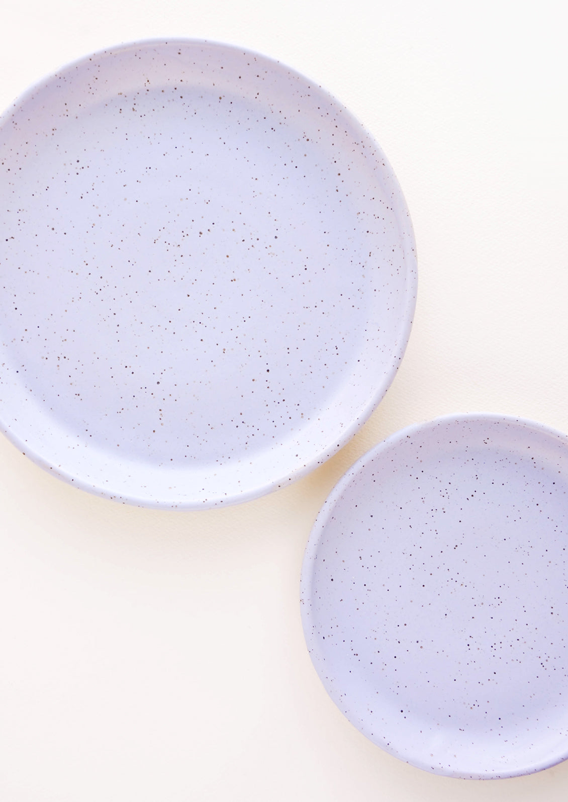 A pair of Lavender Colored Speckled Ceramic Salad & Dinner Plates.