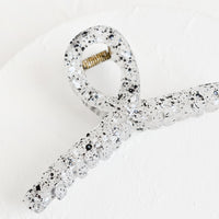 Monochrome Multi: A french twist hair clip in speckled black and white.