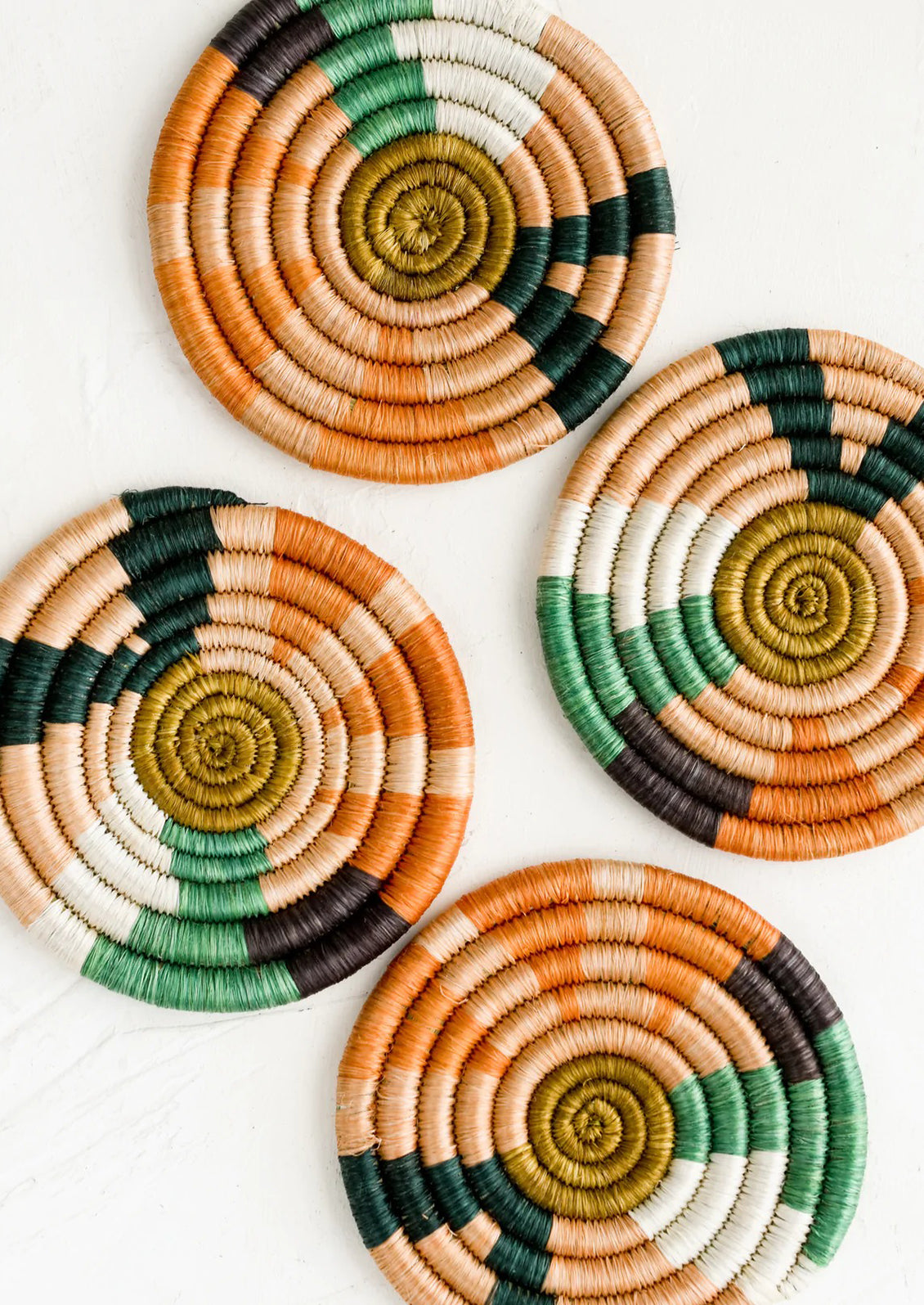 A sweetgrass coaster set of four round coasters.