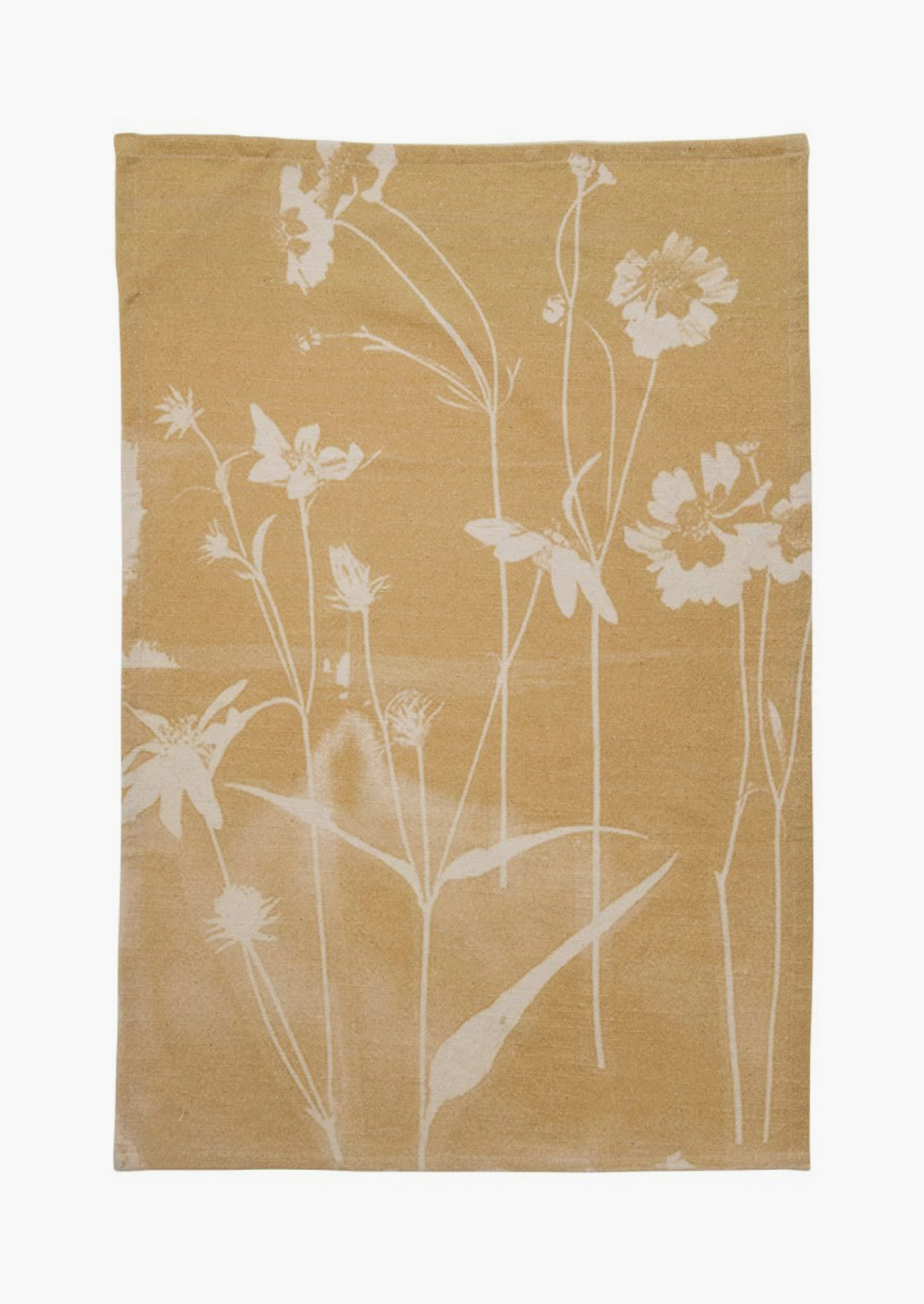 A yellow cotton tea towel with "bleached" look floral print.