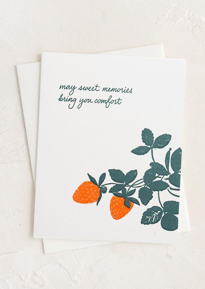 A greeting card with strawberry print and text reading "May sweet memories bring you comfort".