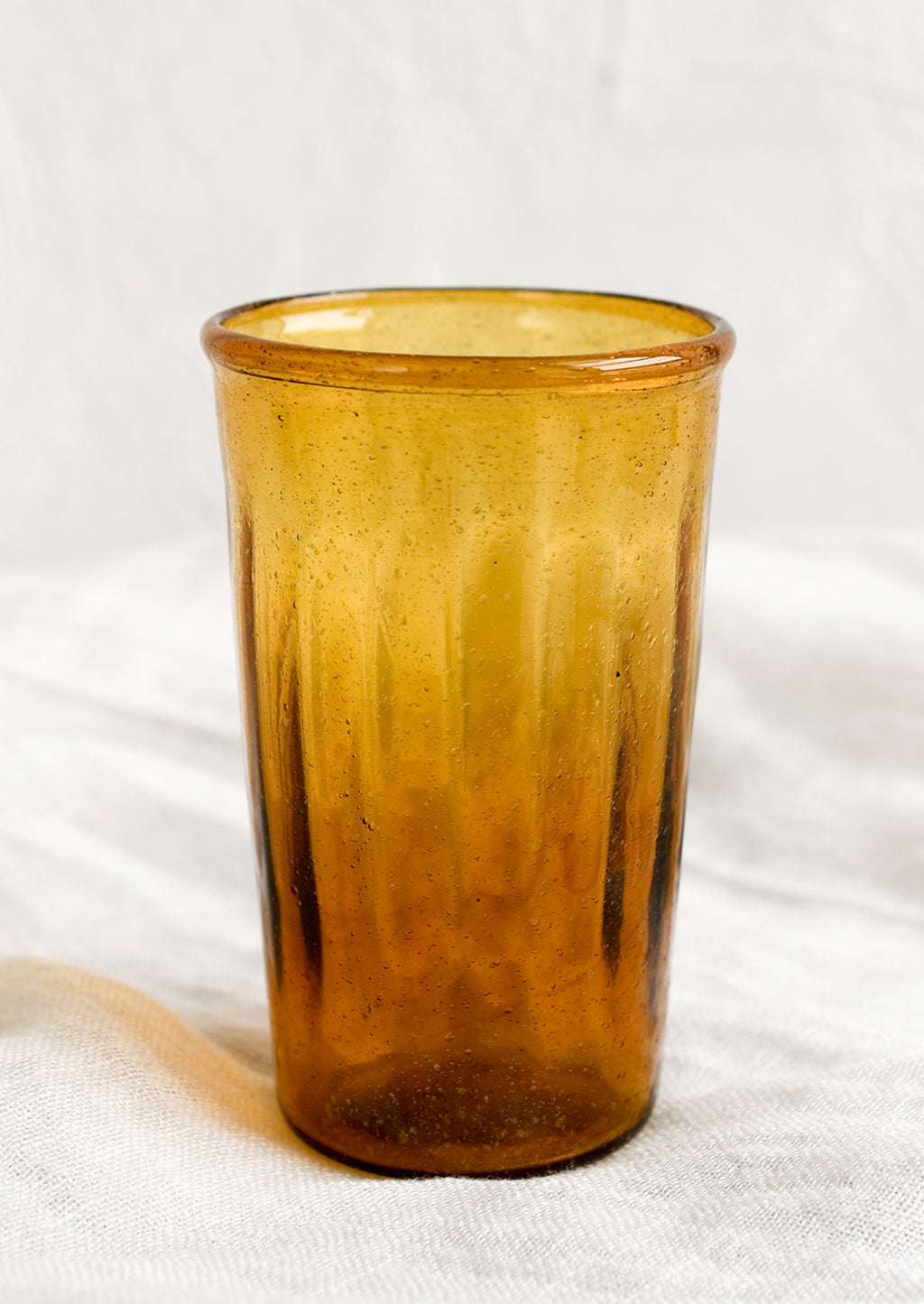 Amber: A glass tumbler in amber color.