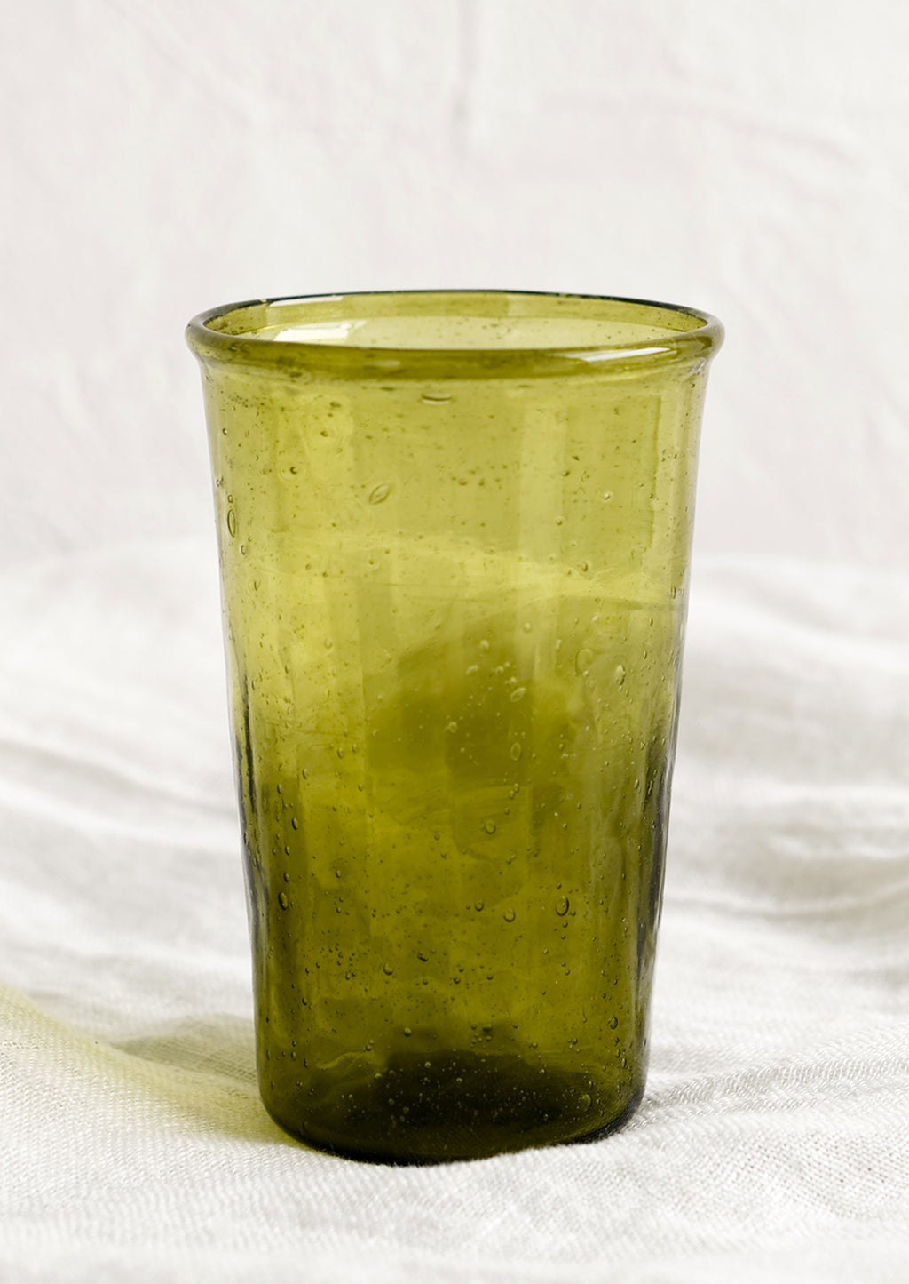 Olive: A glass tumbler in olive green color.