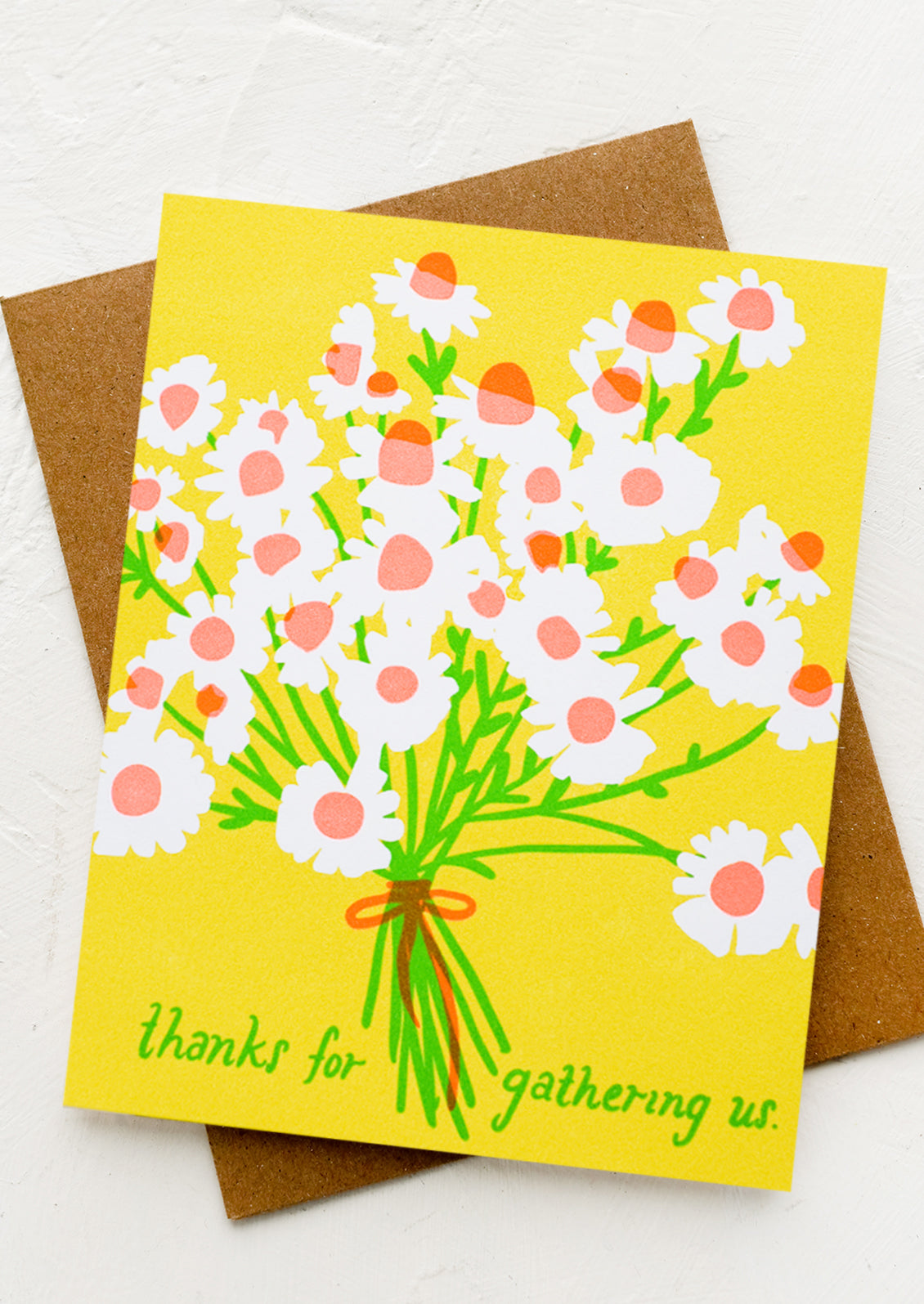 A greeting card with flower bouquet and text reading "Thanks for gathering us.