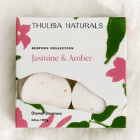 Jasmine & Amber: A box of shower steamer tablets in jasmine & amber scent.