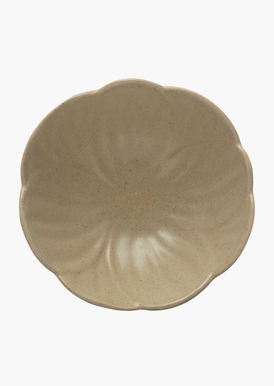 A tan ceramic flower shaped bowl.