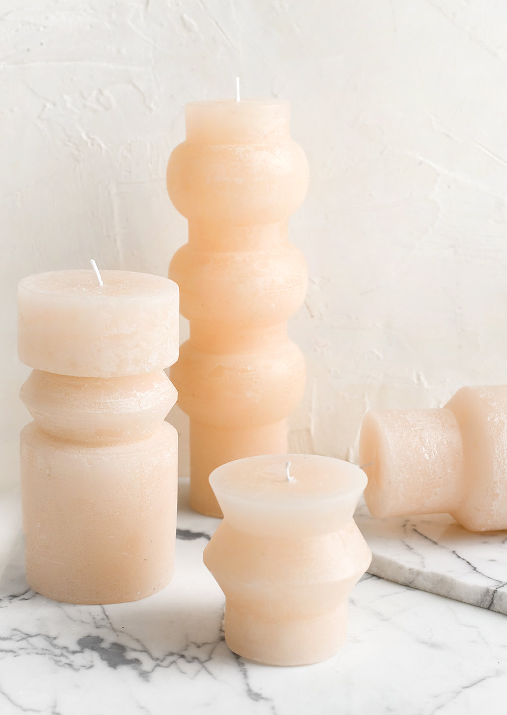 Small / Petal: Assorted shapely pillar candles in petal light pink.