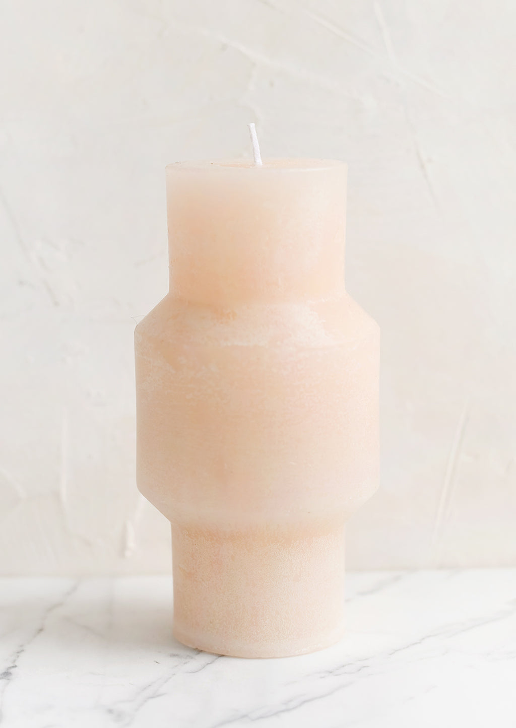 Medium (Plateau) / Petal: A medium carved pillar candle with waxy finish in petal.